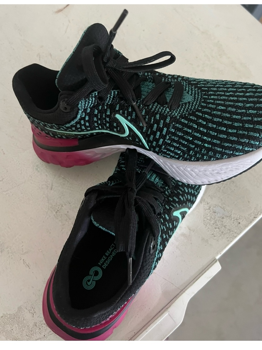 Nike Black and Teal Knit Running Flyknit Sneakers with Pink Heel Accents